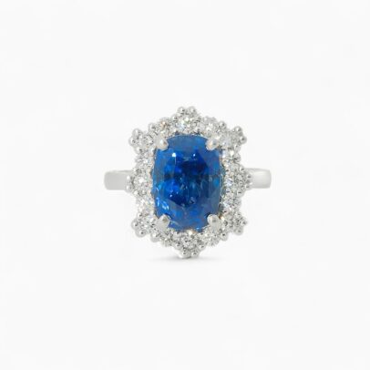 Saraya sapphire and diamond ring in platinum with cushion cut blue sapphire and diamond halo