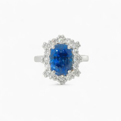Saraya sapphire and diamond ring in platinum with cushion cut blue sapphire and diamond halo