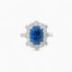 Saraya sapphire and diamond ring in platinum with cushion cut blue sapphire and diamond halo