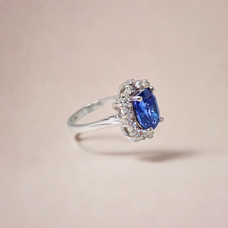Saraya sapphire and diamond ring in platinum with cushion cut blue sapphire and diamond halo