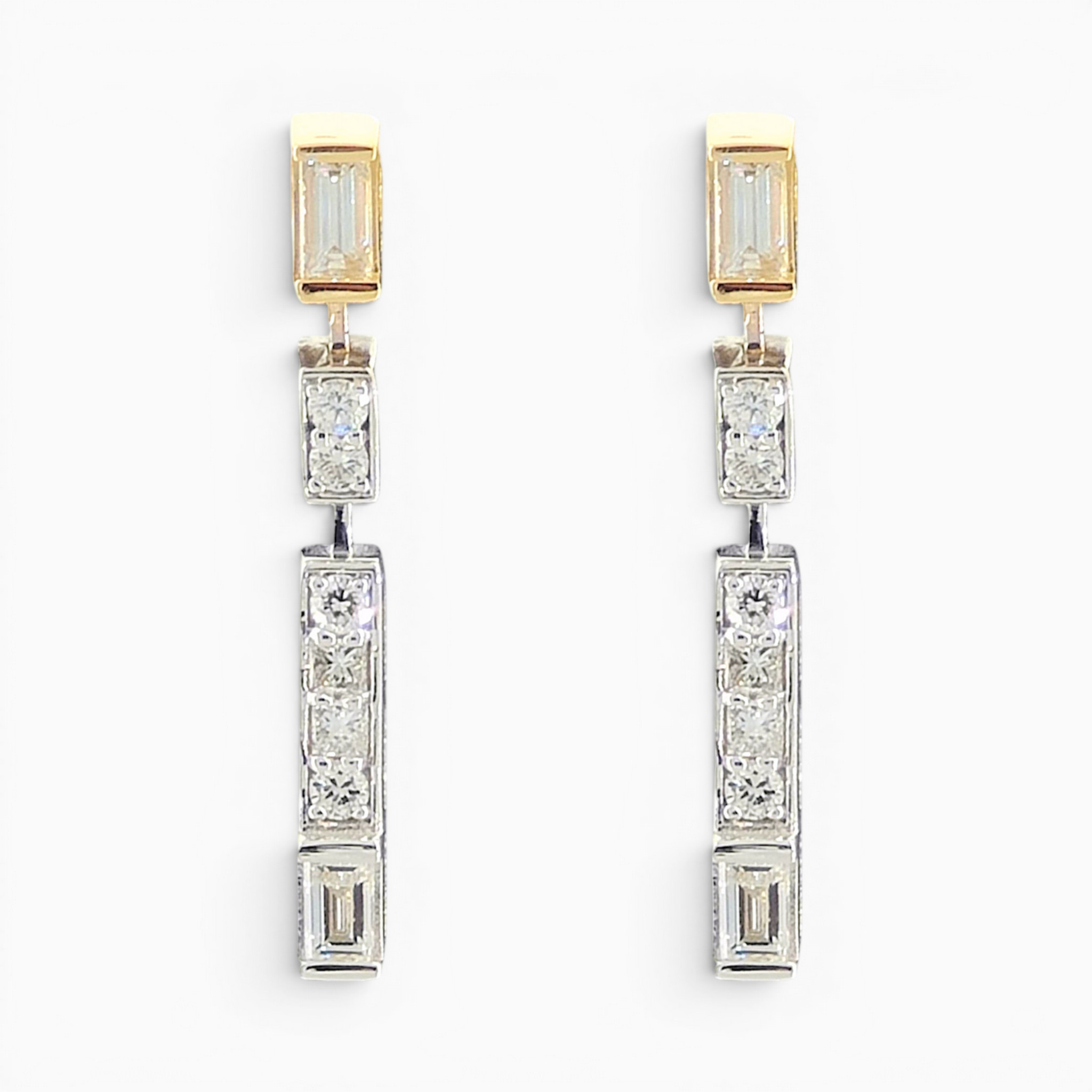 Baguette, Princess and Round Brilliant cut diamond drop earrings