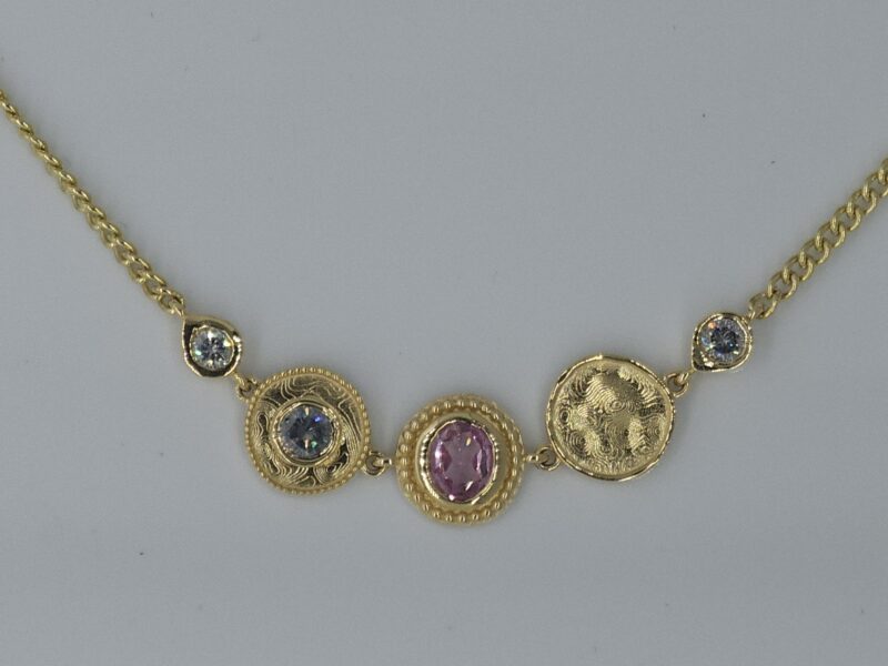 Pink sapphire and diamond necklace 18ct yellow gold