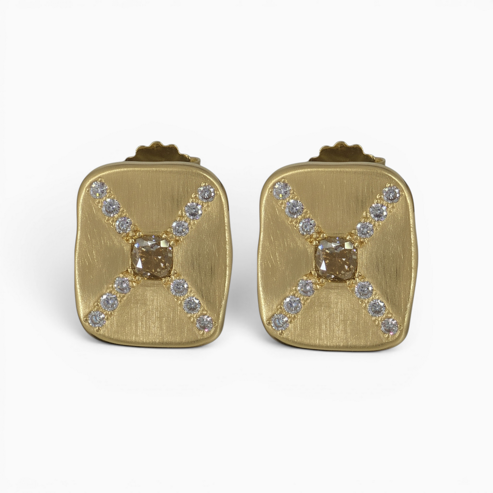 One pair of 18 karat yellow gold grain set organic panel style X shaped diamond earrings.
