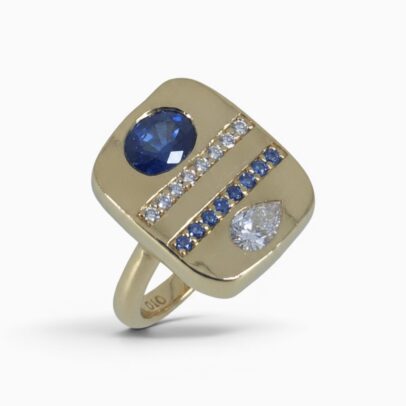 One 18 karat yellow gold rub and grain set sapphire and diamond organic panel ring.
