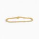 One 18 karat yellow gold bezel set diamond bracelet measuring 17cm in length and 3mm in width.