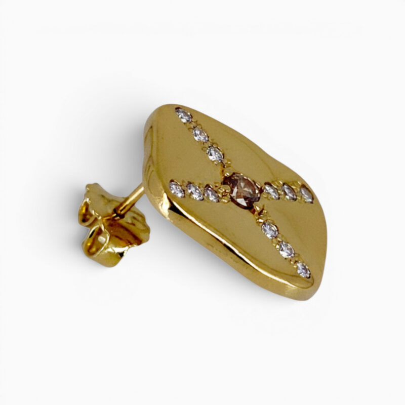 One pair of 18 karat yellow gold grain set organic panel style X shaped diamond earrings.