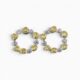 One pair of 18 karat yellow and white gold organic circle rub set diamond earrings.