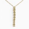 One 18 karat yellow gold yellow diamond pendant and diamond cut trace chain.