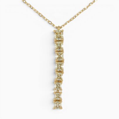 One 18 karat yellow gold yellow diamond pendant and diamond cut trace chain.