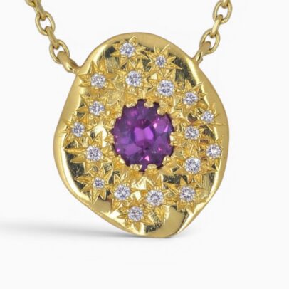 One 18 karat yellow gold star set sapphire and diamond organic pendant, and diamond style cut trace chain