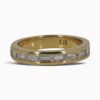One 18 karat yellow gold channel set baguette diamond ring.