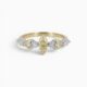 One 18 karat yellow and white gold rub and claw set alternating yellow and white diamond ring
