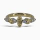 One 18 karat yellow and white gold rub and claw set alternating yellow and white diamond ring.