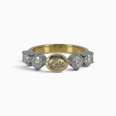 One 18 karat yellow and white gold claw and rub set yellow and white diamond ring.