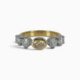 One 18 karat yellow and white gold claw and rub set yellow and white diamond ring.