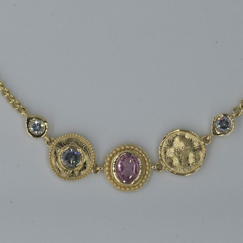 Pink sapphire and diamond necklace 18ct yellow gold