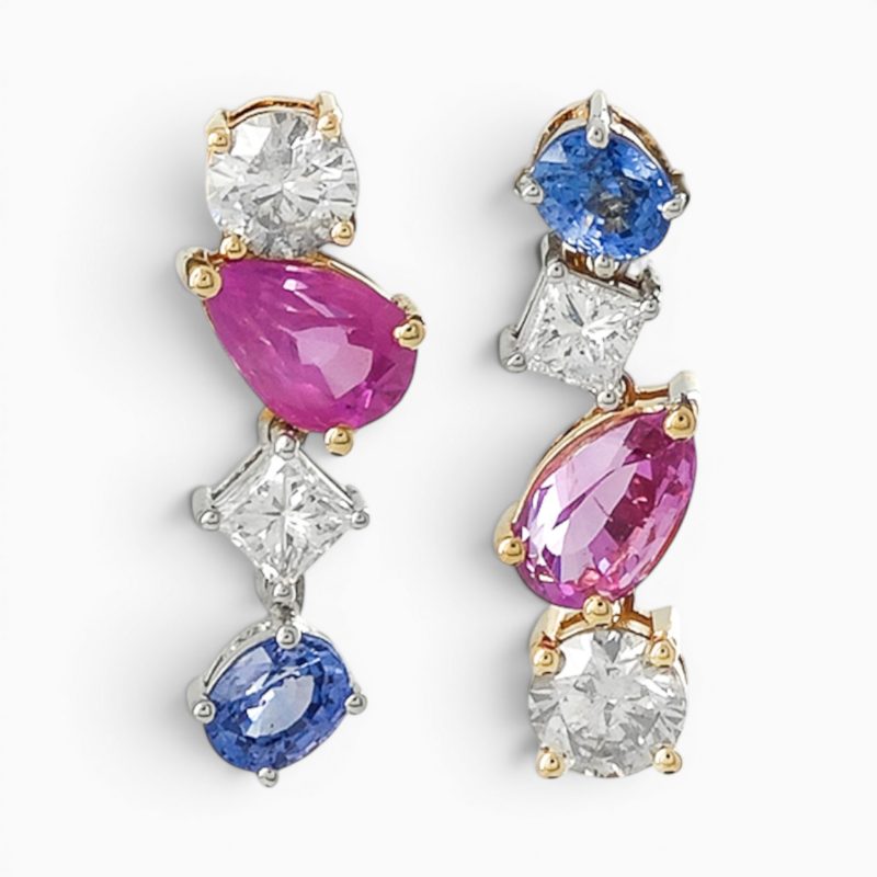 Sapphire drop earrings in 18ct white and yellow gold with pink sapphires, blue sapphires and white diamonds.